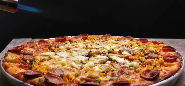will reheating pizza kill bacteria