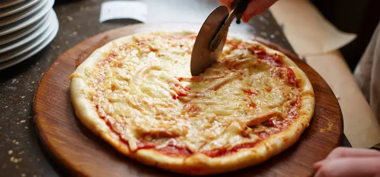 cutting a pizza