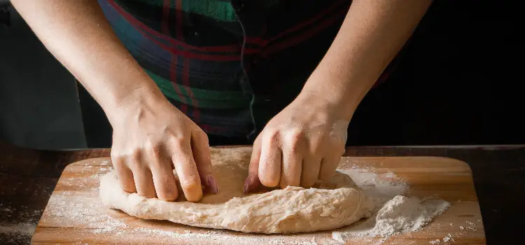 preparing pizza dough